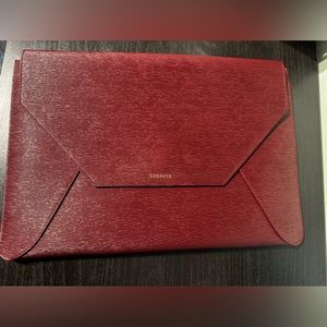 Burgundy, pebbled, Senreve laptop, or portfolio case